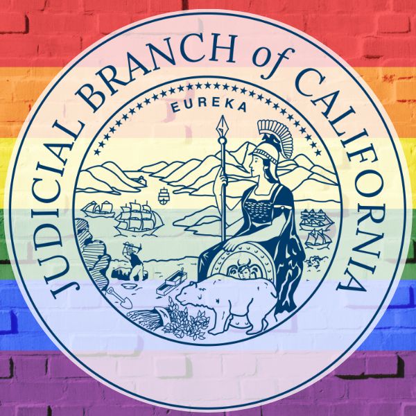 rainbow backdrop and judicial branch seal