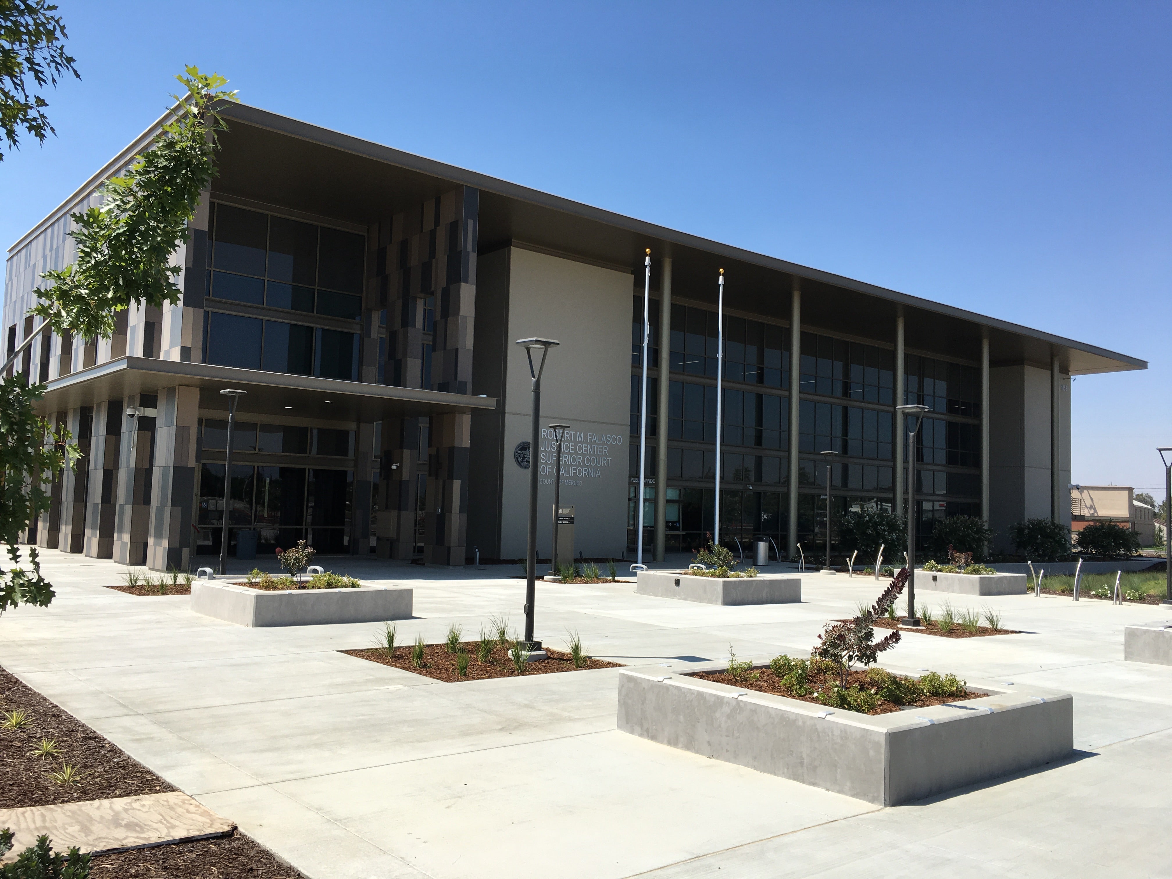 Exterior view of courthouse building showing the main entrance.