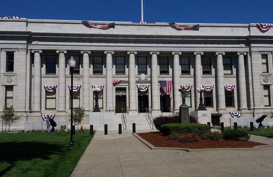 Exterior view of courthouse building showing the main entrance.