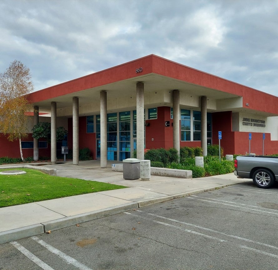 Exterior view of courthouse building showing the main entrance.