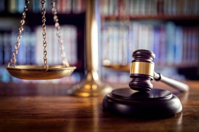 Scale and gavel on a desk
