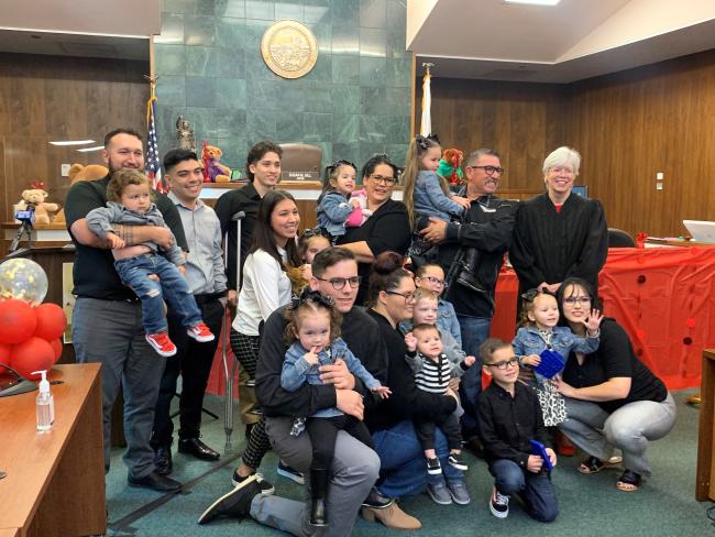 Parents and adoptive children coming together in court